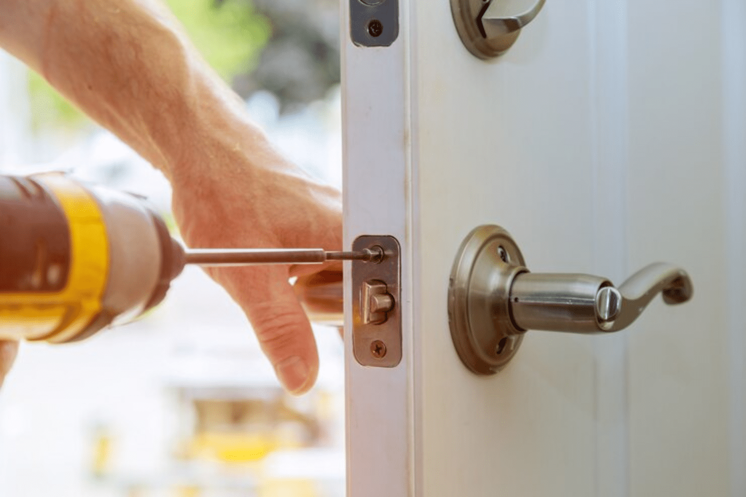 A man fixing the door